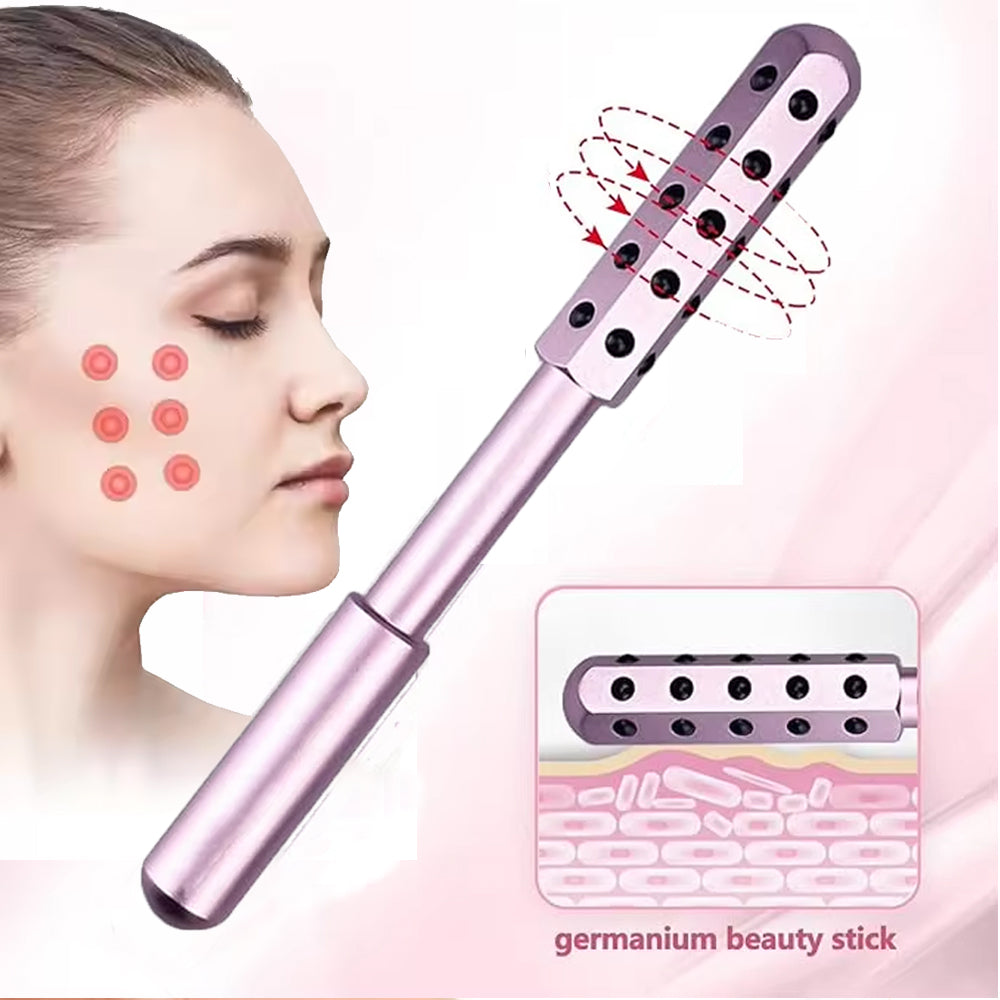 Woman using beauty massaging wand on face for smooth glowing skin
