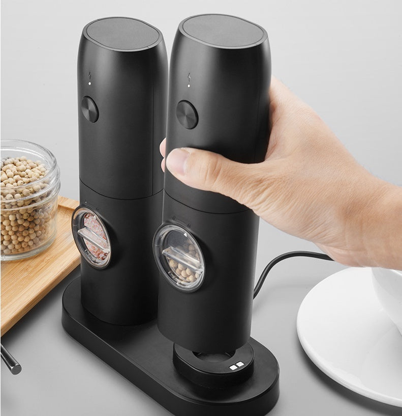 Electric Grinder in use grinding salt and pepper easily one hand operation