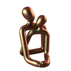 Heartwarming Loving Couple Resin Statue displayed on office desk