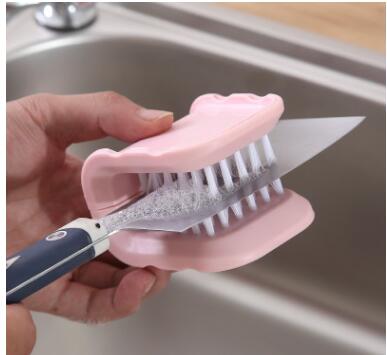 Close-up of U-Shaped Cutlery Cleaner Brush showing durable bristles